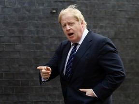 In this Tuesday, March 22, 2016 file photo, Boris Johnson arrives for a meeting at Downing Street in London. Ex-London Mayor Boris Johnson has compared the European Union’s aims to those of Adolf Hitler, arguing that the 28-nation bloc is creating a superstate that mirrors the attempt of the Nazi leader to dominate the European continent. Johnson’s remarks in The Sunday Telegraph on Sunday, May 15 elicited outrage on the part of those campaigning to remain in the EU ahead of a June 23 vote on whether to stay or go. (AP Photo/Kirsty Wigglesworth, file)