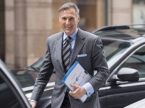 Conservative MP Maxime Bernier arrives outside the offices of the Conservative Party of Canada on Thursday, April 7, 2016 in Ottawa. Bernier has officially launched his campaign to become the Conservative party's next leader.Bernier told a packed stadium in his home riding of Beauce this morning that he would run a small government if elected. THE CANADIAN PRESS/Justin Tang