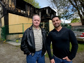 Londoners Doug O?Loughlin, left, and Adam Mortezof stand outside a neighbours home which was destroyed by fire on April 30, 2016. The two men will receive a Citizen Involvement Award from the London Fire Department for their efforts getting family members out of the house during the blaze. (MORRIS LAMONT, The London Free Press)