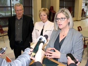 Ontario NDP Leader Andrea Horwath fielded questions from the media following a closed-door session in Chatham Sunday on health-care delivery and service cuts in Chatham-Kent, with Ward 5 municipal councillors Jeff Wesley, left, and Carmen McGregor particularly interested in the future of Sydenham hospital in Wallaceburg. PHOTO TAKEN on Sunday May 15, 2016 in Chatham, Ont. (Vicki Gough/Chatham Daily News/Postmedia Network)