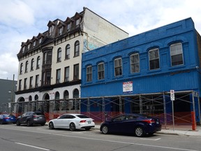 These buildings on King Street have been the source of much contention since they were purchased by developer Vito Frijia. (MORRIS LAMONT, The London Free Press)