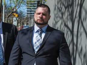 Toronto Police Const. James Forcillo leaves the courthouse at 361 University Ave. on May 16, 2016. (Ernest Doroszuk/Toronto Sun)
