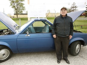 Bill Brown stands in front of the car he made 35 years ago. It is capable of driving from both ends of the vehicle.(Shaun Gregory/Huron Expositor)