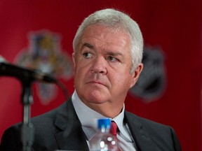 In this Sept. 27, 2013, file photo, Dale Tallon, the Florida Panthers' executive vice president and general manager, listens during an NHL hockey press conference in Sunrise, Fla. (AP Photo/J Pat Carter, File)