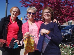 Three area women will be headed to Kenya on June 4 to deliver hand-sewn washable feminine hygiene products to school girls who currently do without. From left Pat Bruvelaitis, Maria Koprich  and team leader Jill Johnston. (HEATHER RIVERS, Sentinel-Review)