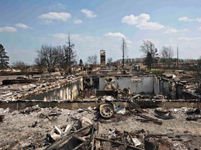The devastated neighbourhood of Beacon Hill is seen after being ravaged by a wildfire in Fort McMurray, May 13, 2016. (REUTERS/Jason Franson)