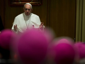 Pope Francis prays during the opening session of the CEI, Italian Episcopal Conference, at the Vatican, Monday, May 16, 2016. (AP Photo/Alessandra Tarantino)