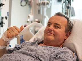 Thomas Manning gives a thumbs up after being asked how he was feeling following the first penis transplant in the United States, in Boston,in this May 13, 2016 photo provided by Massachusetts General Hospital. The organ was transplanted from a deceased donor. (Sam Riley/Mass General Hospital via AP)