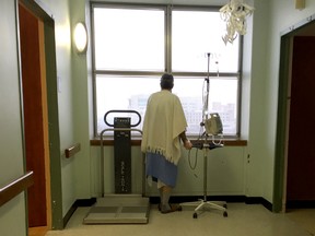File photo of a patient looking out a window at the palliative care unit at St Mary's Hospital Centre in Montreal, Tuesday December 22, 2015.    (Phil Carpenter / Postmedia Network).