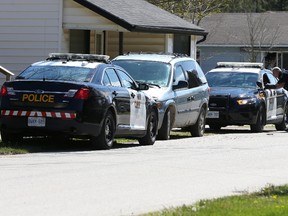 OPP investigate after two men were injured Monday morning when an argument between neighbours in Parkhill turned violent. The men, aged 23 and 21 from North Middlesex, became involved in a dispute on John Street about 9:45 a.m., Middlesex County OPP said. The 23-year-old was stabbed multiple times with a knife, police said. He was taken to hospital for treatment of non-life-threatening wounds and later discharged, police said. The 21-year-old was arrested near the scene. He suffered non-life-threatening wounds and was treated and released from hospital. (CRAIG GLOVER, The London Free Press)