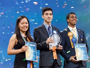 Grade 12 student Austin Wang (centre) of Vancouver won the grand prize for his science project in a competition among 1,700 high school students from 77 countries at the Intel International Science and Engineering Fair in Phoenix. (THE CANADIAN PRESS/HO-Society for Science & the Public)