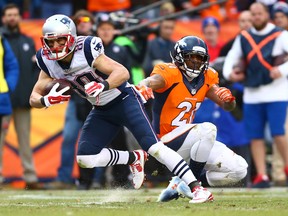 New England Patriots wide receiver Danny Amendola tries to get past Denver Broncos cornerback Aqib Talib in the second half in the AFC Championship football game at Sports Authority Field at Mile High. (Mark J. Rebilas/USA TODAY Sports)