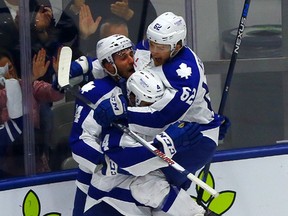 The Marlies celebrate after Richard Clune's goal late in the third period of Game 7 against the Albany Devils on Monday night at the Ricoh Coliseum. The goal held up as the winner. (DAVE ABEL/TORONTO SUN)