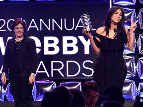 Kara Swisher presents award to Kim Kardashian West on stage at the 20th Annual Webby Awards at Cipriani Wall Street on May 16, 2016 in New York City.  (Photo by Dimitrios Kambouris/Getty Images for The Webby Awards)