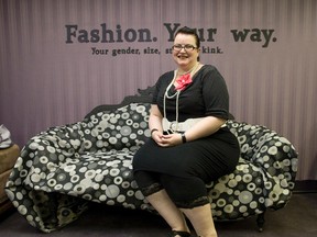 Alternative seamstress Laura Lee Hubbard sits on a couch inside The Naughty Gypsy Studio, a custom clothing boutique inside The Renegade at 232 Dundas St. (CRAIG GLOVER, The London Free Press)