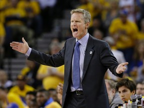 Golden State Warriors head coach Steve Kerr yells during the first half of Game 1 of the NBA basketball Western Conference finals between the Warriors and the Oklahoma City Thunder in Oakland, Calif., Monday, May 16, 2016. (AP Photo/Marcio Jose Sanchez)