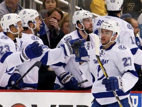 Tampa Bay Lightning forward Jonathan Drouin (27) is greeted by teamates after scoring against the Pittsburgh Penguins in Game 1 of the Eastern Conference final Friday, May 13, 2016, in Pittsburgh. (AP Photo/Gene J. Puskar)