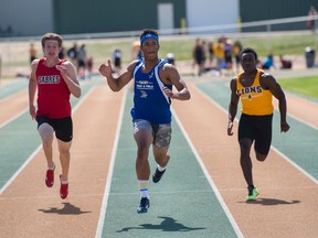 Chuba Hubbard, shown here winning a 100-metre heat at the city high school track finals at Foote Field Tuesday, has verbally committed to Oklahoma State University in football and track, and will be competing in the Olympic Trials in the U-20 category. (Shaughn Butts)