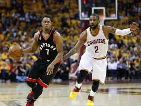 Toronto Raptors guard Kyle Lowry (7) is chased by Cleveland Cavaliers guard Kyrie Irving during Game 1 of the Eastern Conference final in Cleveland on Wednesday May 18, 2016. (Jack Boland/Toronto Sun/Postmedia Network)