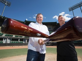 Edmonton Prospects' chief operating officer Craig Tkachuk, left, and Fort McMurray Giants' vice-president and GM Anthony “Dutche” Ianetti pose for a photo at the former Telus Field stadium Tuesday. (David Bloom)