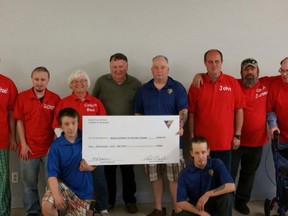 Submitted photo: 
The Knights of Pythias service club recently donated $2,000 to Special Olympics. Accepting the donation are, from left, Michael Peterson, Richard Wellington, Bea Stacey (Chatham-Kent coordinatior), John Krahn, Jerome Caza (coach) and Donald Nash. Making the donation are Knights of Pythias members Charlie Masefield and Jerry Blake in middle, and kneeling is Jake Blake and Duke Blake.