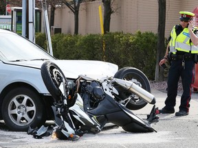 Greater Sudbury Police were at the scene of a collision between a car and a motorcycle on Riverside Drive Wednesday morning. John Lappa/The Sudbury Star