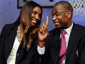 Dikembe Mutombo waves his finger during a news conference at the Naismith Memorial Basketball Hall of Fame in Springfield, Mass. on Sept. 10, 2015. (AP Photo/Jessica Hill)