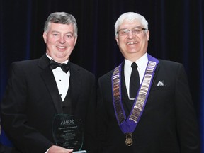 Dr. Patrick Conlon was awarded the Ontario Medical Association Distinguished Service Award. Only one physician in the province receives this award each year. Pictured here, Dr. Conlon (left) with OMA president Dr. Michael Toth. (Contributed photo)