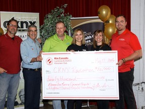 The Lucknow Kinsmen presented a cheque for $10,000 to the AMGH Foundation from its Music in the Field event. (Contributed photo)