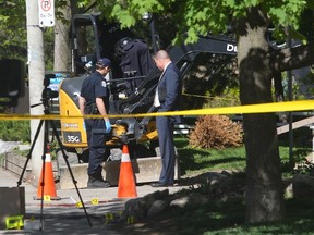A 42-year-old man was found beaten to death on Gloucester St., near Yonge and Wellesley Sts., early Won May 18, 2016. Toronto Police homicide detectives and forensics officers spent the morning gathering evidence at the bloody scene. (Chris Doucette/Toronto Sun)