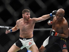 Michael Bisping (left), seen here taking on Anderson Silva at UFC Fight Night in London on Feb 27, 2016, will replace Chris Weidman at UFC 199 next month. (Per Haljestam/USA TODAY Sports)