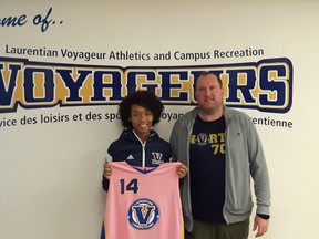 Danielle Reid of Brooklin, Ont., poses with Laurentian Voyageurs women's basketball head coach Jason Hurley. Reid has committed to Laurentian and the women's basketball program for next year. Supplied photo
