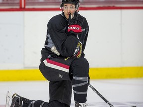 Patrick Wiercioch pauses on the ice as the Ottawa Senators practise at Canadian Tire Centre in Ottawa on Feb. 29, 2016. (Wayne Cuddington/Postmedia)