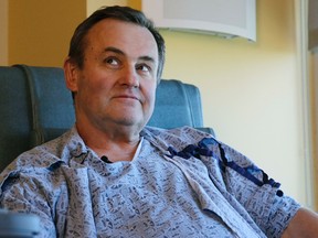 Thomas Manning, of Halifax, Mass., reacts during an interview in his hospital room at Massachusetts General Hospital, on May 18, 2016, in Boston. Manning is the first man in the United States to undergo a penis transplant. (AP Photo/Elise Amendola)