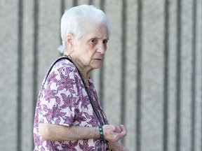 Erna Kern, 85, arrives at the court house before pleading guilty in the attempted murder case of her husband, in London, Ont. on Wednesday May 18, 2016. Kern attempted to kill her husband, who lives in a nursing home, along with herself and their cats.  (CRAIG GLOVER, The London Free Press)