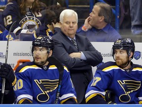 Blues head coach Ken Hitchcock watches during the second period in Game 2 of the NHL's Western Conference final against the Sharks, on Tuesday, May 17, 2016, in St. Louis. (Jeff Roberson/AP Photo)