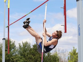 Brayden Henri, of College Notre-Dame, competes in the senior boys pole vault event at the local high school track and field championships at the track at Laurentian University in Sudbury, Ont. on Wednesday May 18, 2016. John Lappa/Sudbury Star/Postmedia Network