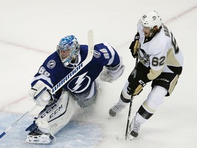 Pittsburgh Penguins winger Carl Hagelin (62) scores on Tampa Bay Lightning goalie Andrei Vasilevskiy during Game 3 of the Eastern Conference final Wednesday at Amalie Arena in Tampa. (Reinhold Matay/USA TODAY Sports)