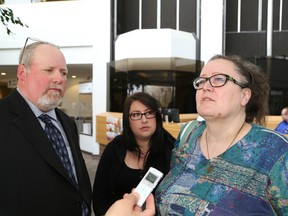 John Lappa/Sudbury Star
Alan Prusila and Julia Neville, middle, of the Sudbury Animal Coalition, look on as Linda Makela, of Greater Sudbury Area Lost and Found Pets, makes a point during an interview with The Sudbury Star at Tom Davies Square in Sudbury on Wednesday.