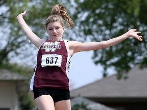 Amy Nap of the Wallaceburg Tartans soars during the senior girls' long jump at the LKSSAA track and field championship at the Chatham-Kent Community Athletic Complex in Chatham, Ont., on Wednesday, May 11, 2016. Nap finished second to Chatham-Kent's Erin Young after winning the triple jump Tuesday. Mark Malone/Chatham Daily News/Postmedia Network