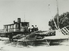 The T J Collop loading logs near Mitchell's Bay.