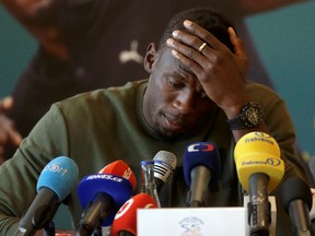 Jamaican sprinter Usain Bolt reacts during a news conference before the Ostrava Golden Spike athletics meeting in Prague, Czech Republic on May 18, 2016. (REUTERS/David W Cerny)