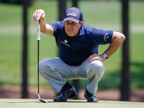 Phil Mickelson looks over the green on third hole during the third round of the 2016 Wells Fargo Championship at Quail Hollow Club in Charlotte, N.C. on May 7, 2016. (Jim Dedmon/USA TODAY Sports)