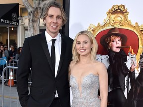 Dax Shepard, left, and Kristen Bell arrive at the world premiere of "The Boss" at the Regency Village Theatre on Monday, March 28, 2016, in Los Angeles. (Photo by Jordan Strauss/Invision/AP)