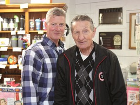 Steve Rock and Walter Gretzky are old friends through their work with Team Canada ’72. Gretzky stopped by Rock’s store The Gravy Boat Kitchen Store in Bayfield on May 14. (Laura Broadley/Goderich Signal Star)