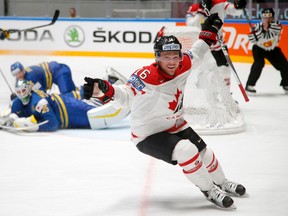 Canada's Max Domi celebrates his goal against Sweden's goalie Jacob Markstrom during world hockey championship quarterfinal action in St. Petersburg, Russia, on Thursday, May 19, 2016. (Dmitri Lovetsky/AP Photo)
