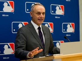 Commissioner Rob Manfred speaks to reporters during a news conference at Major League Baseball headquarters in New York, on Thursday, May 19, 2016. (Mary Altaffer/AP Photo)