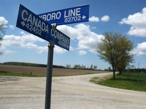 A pair of road signs at the intersection of Roxboro Line and Canada Company Road is pictured in Walton, Ont. May 19.(Photo taken by Justin Prince)