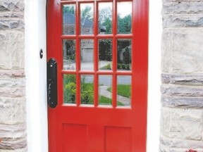 This rounded door, painted with red (Benjamin Moore?s 2000-10 Red) draws attention to its unique shape.
