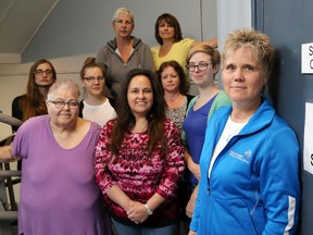 Luke Hendry/The Intelligencer
Sexual Assault Centre executive director Kim Charlebois, foreground, stands with her team outside their Octavia Street office in Belleville Thursday. Charlebois said difficult criminal trials and victim-shaming won't likely deter people from counselling, but may mean some victims don't pursue justice in the courts.